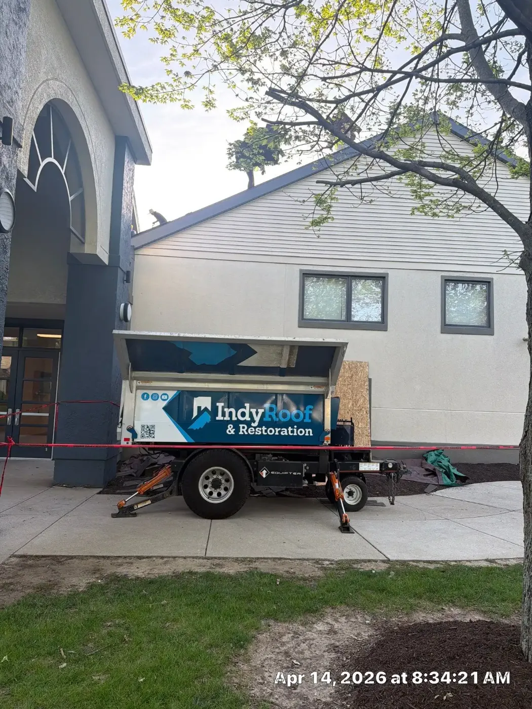 Tarping and dry-in on a Avon commercial roof